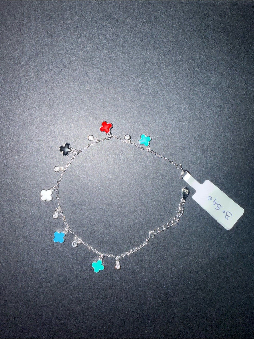 Silver Charm Bracelet with Red, Black, White & Turquoise Clover Charms